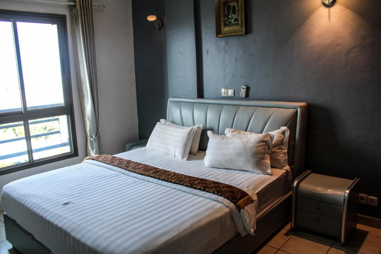 Residence Le Carat Bonapriso Дуала Экстерьер фото